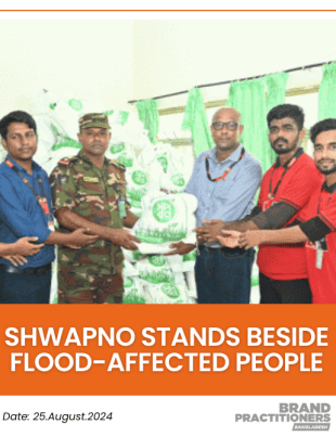 Shwapno stands beside flood-affected people